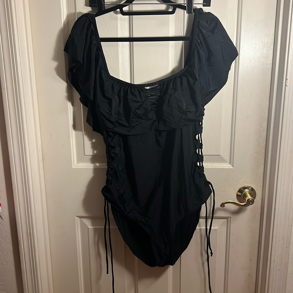 Rue 21 ruffled off shoulder swimsuit with lattice sides and ties. Never worn. 3X